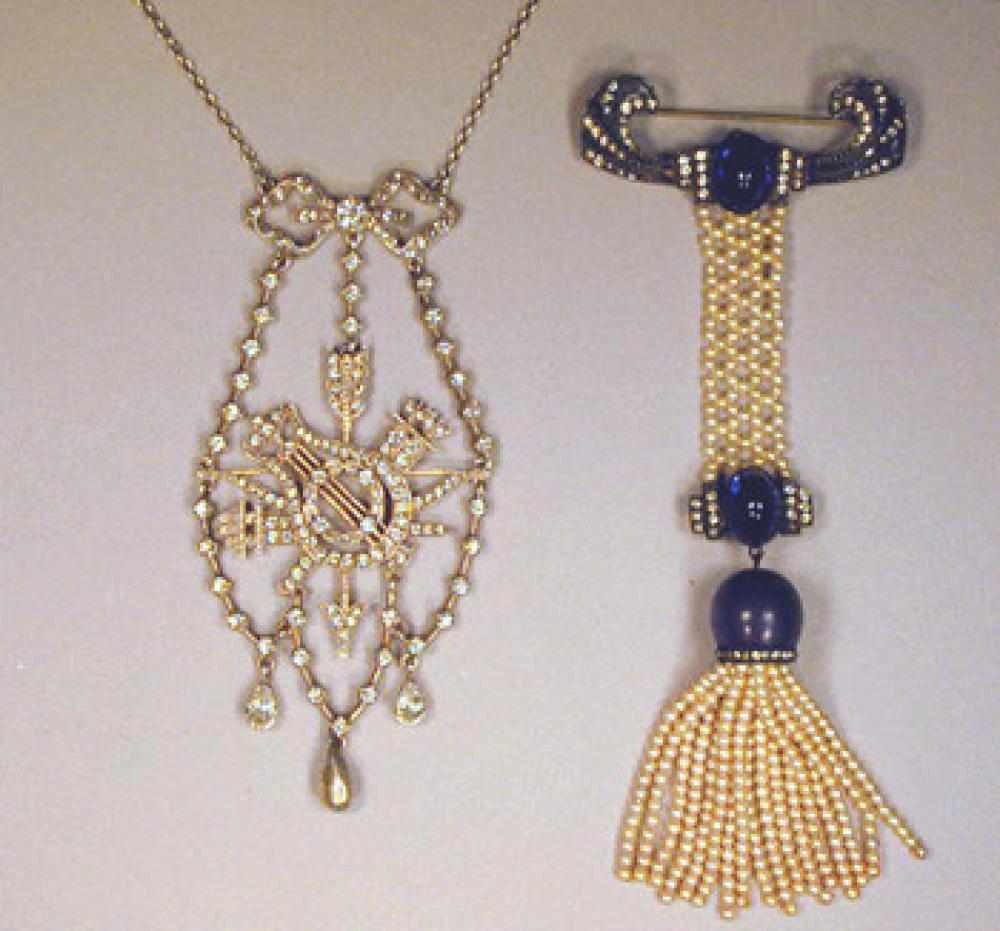 Trophies of Love and Music Necklace and Brooch

Lot 162
Trophies of Love and Music Necklace and Brooch
 With necklace of delicately set rhinestones in white metal and pin of faux cabochon sapphire and pearls.