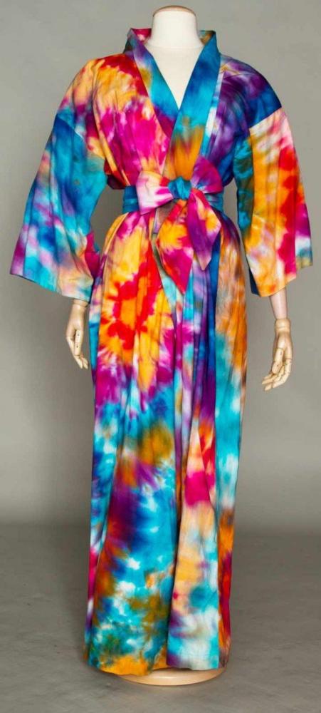SERENDIPITY DOUBLE KIMONO ROBE, 1972

Outer robe of royal purple crushed velvet; inner robe of tie-dye cotton muslin, both w/ sash ties & labels "Serendipity", L 62", excellent. Brooklyn Museum