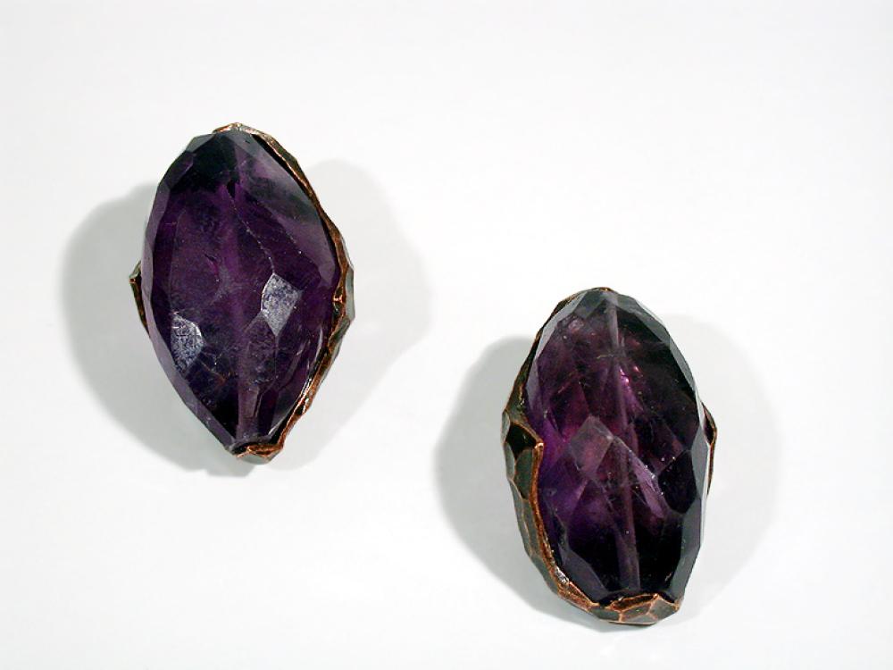 Two Yves Saint Laurent Amethyst Earclips

Lot 939
Two Yves Saint Laurent Amethyst Earclips
 Large irregular cut amethyst chunk set in copper, signed YSL.