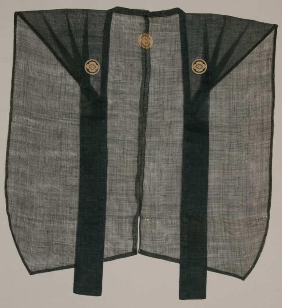 HEMP SAMURAI JACKET, JAPAN, 19TH C

Hand done blue leno weave, 3 family mon on jacket, shoulder points stiffened w/reed, L 28.5", Wd 27", to be worn over Samurai’s other garments, excellent.