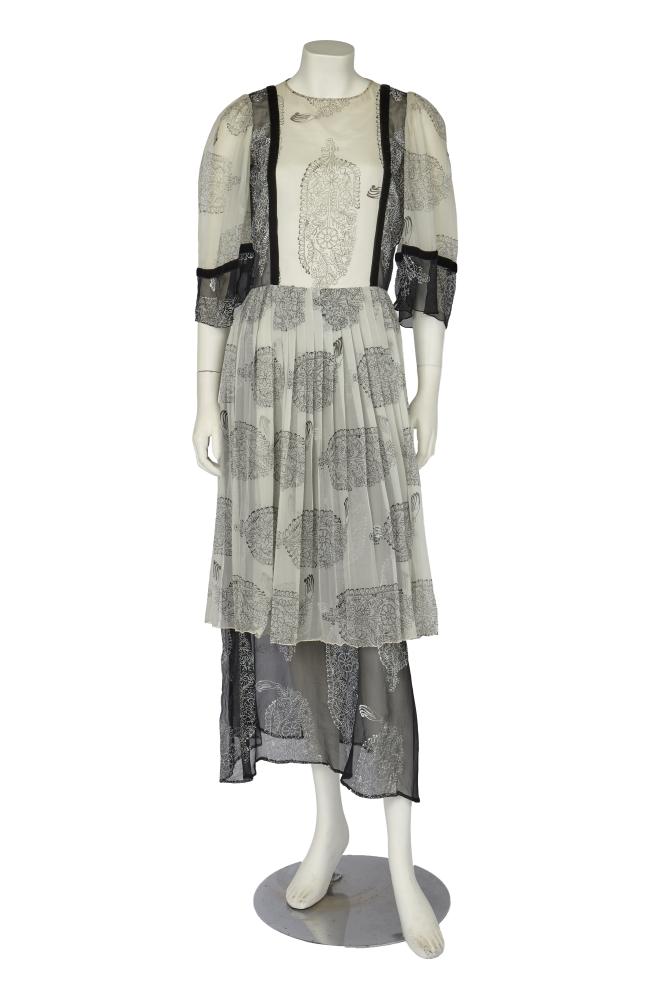 A Thea Porter printed chiffon dress, 1970s

A Thea Porter printed chiffon dress, 1970s

Couture labelled, with black on white Michael Zeld print of foliate botehs, pleated overskirt, trimmed with black velvet ribbons, bust 86cm 34in

Provenance: the late Lola Yearwood collection

Share this lot: