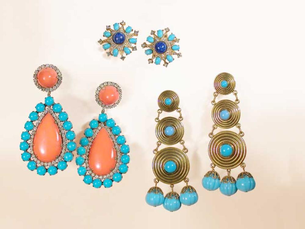 Group of Faux Turquoise Kenneth Jay Lane Earrings

Lot 919
Group of Faux Turquoise Kenneth Jay Lane Earrings
 The first a single large coral colored stone teardrop outlined with faux turquoise and rhinestones in pendant form, the second drops of graduated gilt-metal grooved discs with faux turquoise stones in the center and trimming base disc; the third faux lapis and turquoise starburst earclips, first and second marked: KJL.