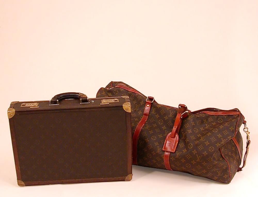 Two Louis Vuitton Cases

Lot 1005
Two Louis Vuitton Cases
 The first a canvas duffel, monogrammed, tan leather trim and shoulder strap, 24 x 12 x 10 inches, the second a briefcase, monogrammed, 17 1/4 x 12 1/2 x 3 1/2 inches, both labeled: Louis Vuitton/Paris/Made in France. 
 The first in fair condition, the second interior discolored and worn handle.