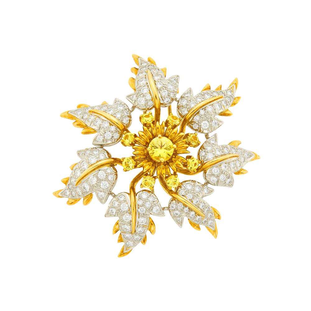 Private Palm Beach Collection18 kt., one round yellow sapphire ap. .95 ct., 8 round yellow sapphires ap. 1.30 cts., 125 round diamonds ap. 3.10 cts., signed Tiffany & Co., Schlumberger Studios, ap. 21.7 dwts.

Yellow sapphires: bright medium deep very slightly greenish-yellow, cleanish, lively.Diamonds: F-G-VSDiameter 2 x 2 1/16 inches.                            
Any condition statement is given as a courtesy to a client, is an opinion and should not be treated as a statement of fact and our Organization shall have no responsibility for any error or omission. Please contact the specialist department to request further information or additional images that may be available.