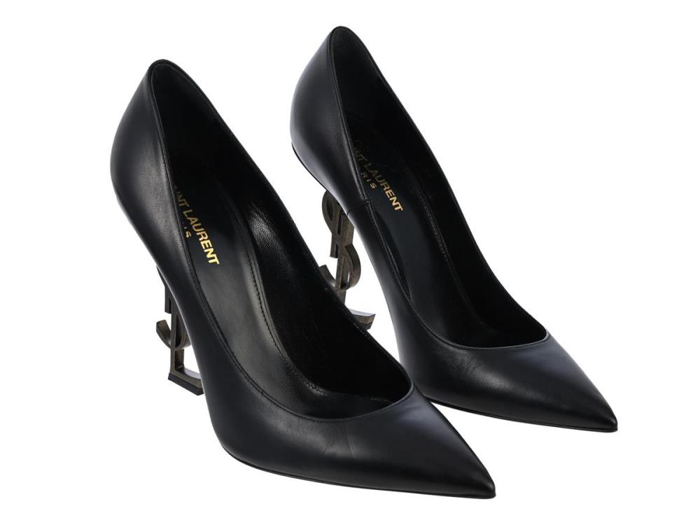 Clothes

Shoes

SAINT LAURENT, SHOES, Opyum Pumps, black leather, metal-tone hardware, heel 11,5 cm, size 40, dustbag, signs of wear on sole. Very Good Condition.