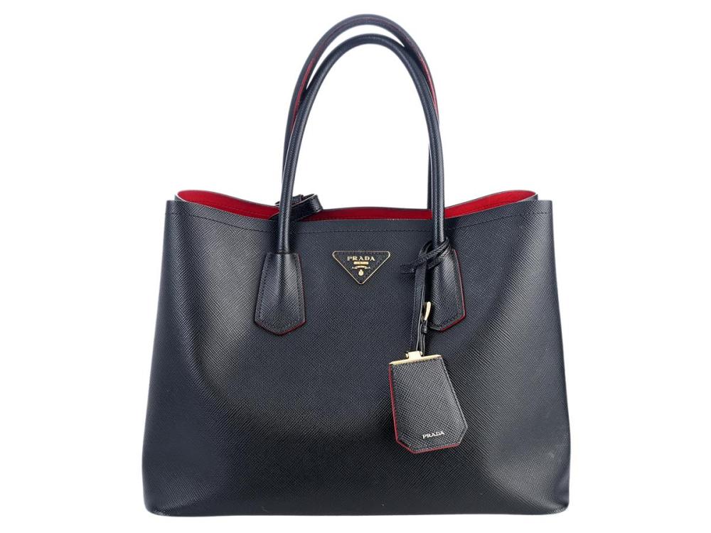 Accessories

Handbags

BAG, PRADA, Tote Bag, black saffiano leather, gold-tone hardware, 36x27x18 cm, detachable shoulder strap, some stains on leather, box.