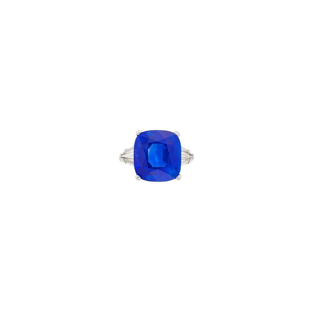 Collection of a Distinguished Southern IndustrialistOne cushion-shaped sapphire weighing 10.57 cts., 6 tapered baguette diamonds. Size 5.
 
With SSEF report no. 153086 stating Kashmir origin, with no indications of heating.
With AGL report no. 1155542 stating Kashmir origin, with no gemological evidence of heat.

Sapphire: medium deep velvety blue, liquid-filled feather vertically across pavilion with halo around it, visible from table with a loupe, some color zoning to the side, very good color concentration to the eye, shallow crown angles, lively.                            
Any condition statement is given as a courtesy to a client, is an opinion and should not be treated as a statement of fact and our Organization shall have no responsibility for any error or omission. Please contact the specialist department to request further information or additional images that may be available.