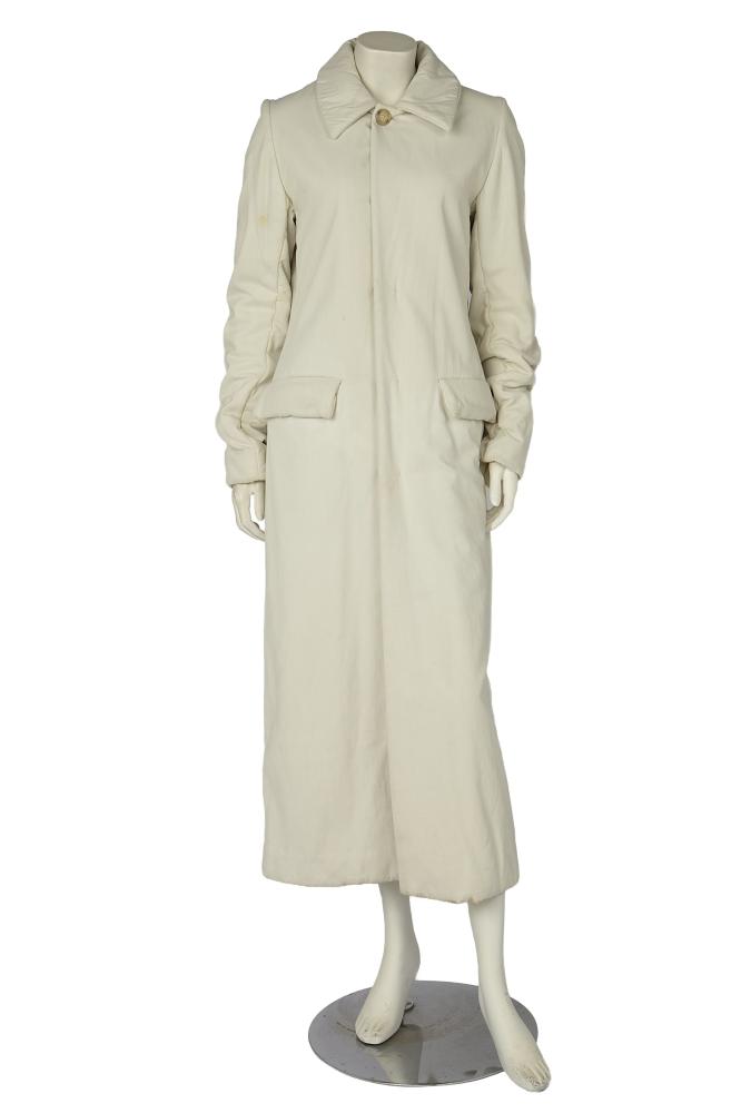 A Maison Martin Margiela padded white cotton coat, circa 2001

A Maison Martin Margiela padded white cotton coat, circa 2001

blank label, size GB 10, of synthetic fleece-lined cotton, with flap pockets, button closure, long buttoned split to rear hem, chest 102cm 40in

Share this lot: