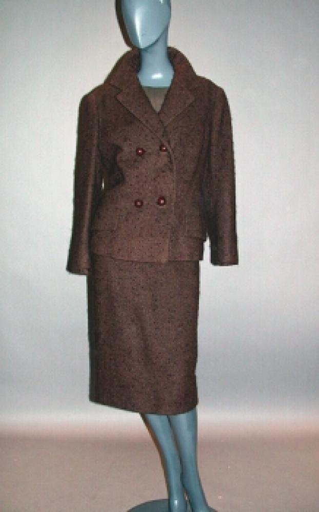 Balmain Brown Mohair Suit

Lot 541
Balmain Brown Mohair Suit
 French, mid 1960s 
 Comprising a double breasted waist length jacket, straight skirt and two brown chiffon blouses, size 8-10, labeled: Pierre Balmain/Paris, tape label no: 121543.
Suit very good condition, wear to blouses.