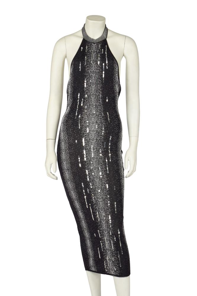 A John Galliano black and silver halter-neck jersey dress, circa 2000

A John Galliano black and silver halter-neck jersey dress, circa 2000

labelled, formed from graduated black and silver striped knit, flecked overall with lurex threads, very low curved open back, bust approx 81cm 32in

Share this lot: