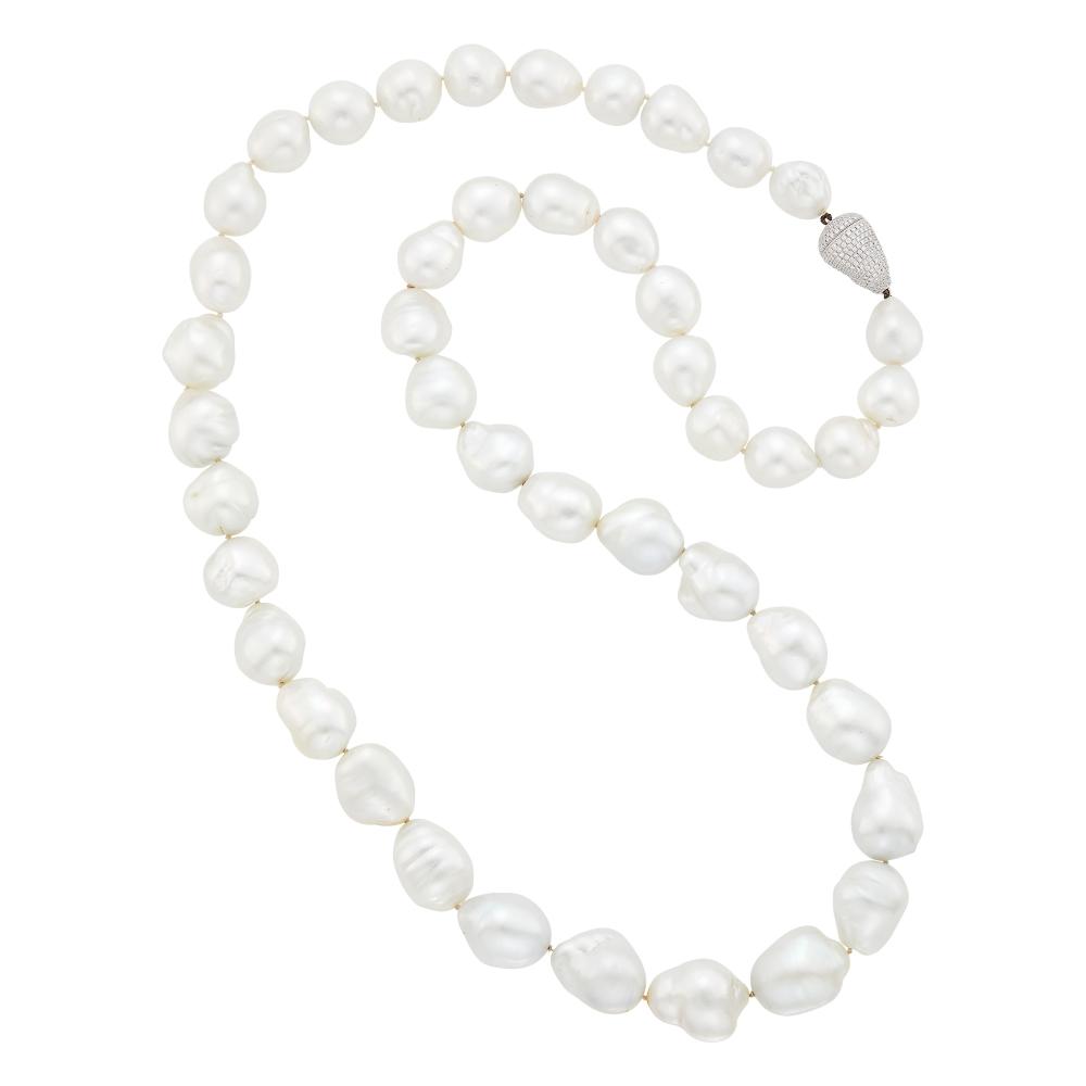 Property from the Collection of Augusta Patton18 kt., 44 vari-shaped baroque pearls ap. 23.0 x 19.0 to 16.0 x 14.6 mm., peanut-shaped clasp of small round diamonds ap. 2.00 cts. Length 35 inches.

Pearls: white with rose and green orient, typical ridges, ripples and pronounced bubbles, very good luster.Diamonds: H-I-VS.Clasp: 7/8 x 1/2 inch.                            
Any condition statement is given as a courtesy to a client, is an opinion and should not be treated as a statement of fact and our Organization shall have no responsibility for any error or omission. Please contact the specialist department to request further information or additional images that may be available.