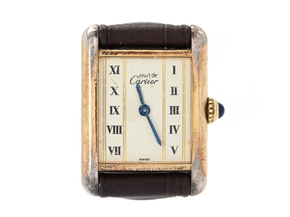 Watches

Cartier

must de CARTIER, Tank, Cal 057, Case no. 02917 / 557051, ladies´ wristwatch, 20,5 x 20 (28) mm, gilt silver (partly worn off), quartz, mineral crystal, defect (not working, needs overhaul), leather strap approx. 1990.