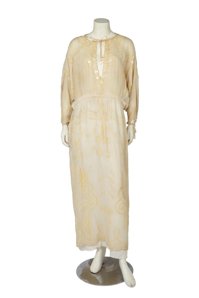 A Zandra Rhodes printed chiffon gown, ’Cactus and Cowboy’ collection, Spring-Summer 1976

A Zandra Rhodes printed chiffon gown, ’Cactus and Cowboy’ collection, Spring-Summer 1976

unlabelled, but with original fabric ’receipt’ dated March 11th 1977, of pale yellow silk chiffon printed with yellow ’Cactus Everywhere’ repeats, the neckline trimmed with white flower petal paillettes, with shirred waistband, the full-length gathered skirt lined in cream satin, waist 91cm 36in

Share this lot: