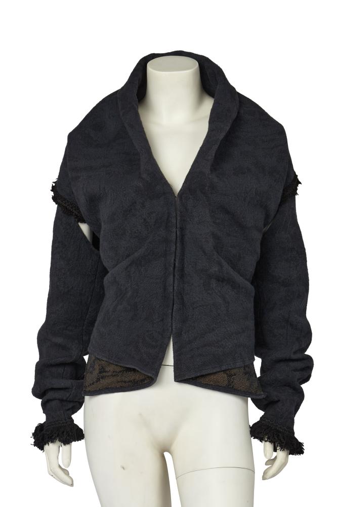 A Maison Martin Margiela Artisanal charcoal grey furnishing fabric jacket, circa 2004

A Maison Martin Margiela Artisanal charcoal grey furnishing fabric jacket, circa 2004

0 label, the fabric figured with floral designs, of complex construction, with cutouts to back and underarms, exaggerated collar, hook and loop closure, edged with black fringing, bust approx 102cm 40in

Share this lot: