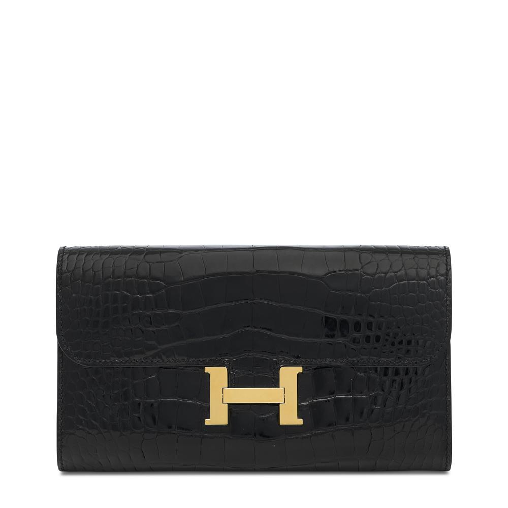 A SHINY BLACK ALLIGATOR CONSTANCE TO GO WITH GOLD HARDWARE

HERMÈS, 2022

GRADE: 3 
20.5 w x 12 h x 4 d cm 
includes shoulder strap, small dustbag, dustbag, care booklet and box  
Alligator Mississippiensis, Annexe CITES II-B 
“This lot is subject to CITES export/import restrictions. The lot can only be shipped within the European Union or personally picked up from our Paris saleroom. We apologize in advance if we are unable to deliver the lot to the shipping address that you specified at registration. Please refer to the “Conditions of Sale” or contact the department for further details.”