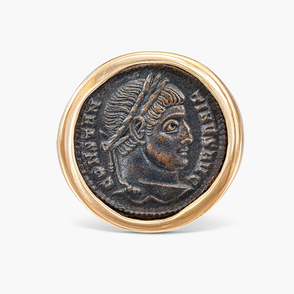 Bulgari

Set with a an ancient coin depicting the profile of Constantine I, with laurel wreath motif to the reverse.