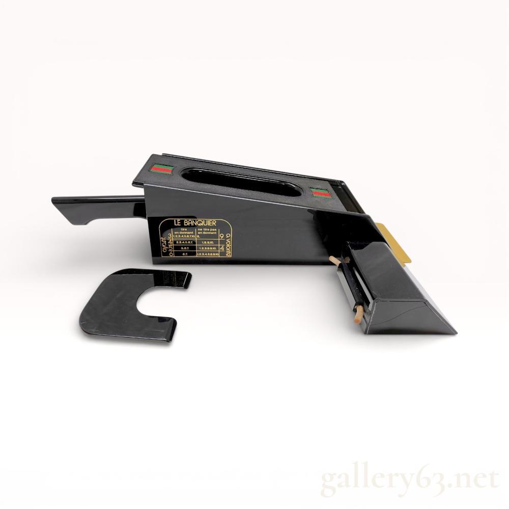 Description
Authentic vintage Gucci playing card shooter.