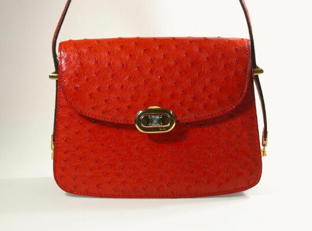 Celine Red Ostrich Bag

Lot 874
Celine Red Ostrich Bag
 The double pocket clutch with rounded flap, silver and gilt-metal closure and fittings, optional ostrich strap, 10 x 8 inches, labeled: Celine/Paris/Made in France. 
Excellent condition.