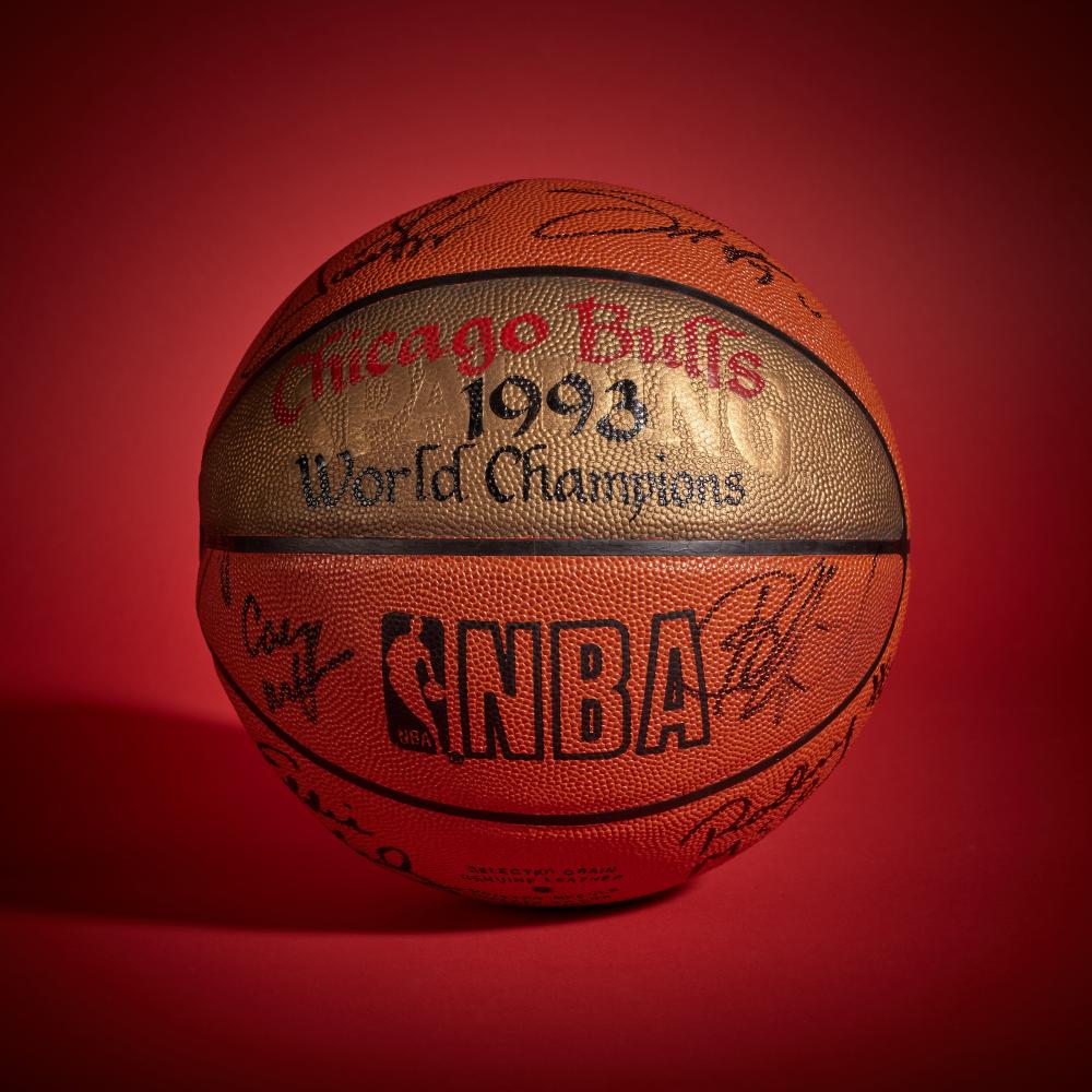 1993 Chicago Bulls ’World Champions’ Basketball | Signed by Michael Jordan, Scottie Pippen, and Others

SPALDING BASKETBALL

Circa 1993

Offered in this lot is a basketball signed by members of the 1992–1993 Chicago Bulls, painted with the inscription “Chicago Bulls 1993 World Champions.” Chicago finished the regular season 57–25, led by the duo of Scottie Pippen and Michael Jordan, who had guided the team to the top of the league over the previous two seasons.

Pippen was a key contributor, anchoring the defense, facilitating the offense, and allowing head coach Phil Jackson’s system to operate at its best.

The Bulls carried their regular-season form into the playoffs. After sweeping the Atlanta Hawks in the first round, Chicago overcame a determined Cleveland Cavaliers team in the semifinals and then faced the New York Knicks in a hard-fought Eastern Conference Finals. In the NBA Finals, the Bulls met a resilient Phoenix Suns team led by league MVP Charles Barkley. Chicago prevailed in six games, securing its third straight championship.

This basketball is signed by Scottie Pippen, Michael Jordan, B.J. Armstrong, Ricky Blanton, Bill Cartwright, Joe Courtney, Jo Jo English, Horace Grant, Stacey King, Rodney McCray, Ed Nealy, John Paxson, Will Perdue, Trent Tucker, Darrell Walker, Corey Williams, and Scott Williams. The ball comes directly from the Collection of Scottie Pippen.

The basketball is accompanied by a letter from James Spence Authentication in regards to the signatures.