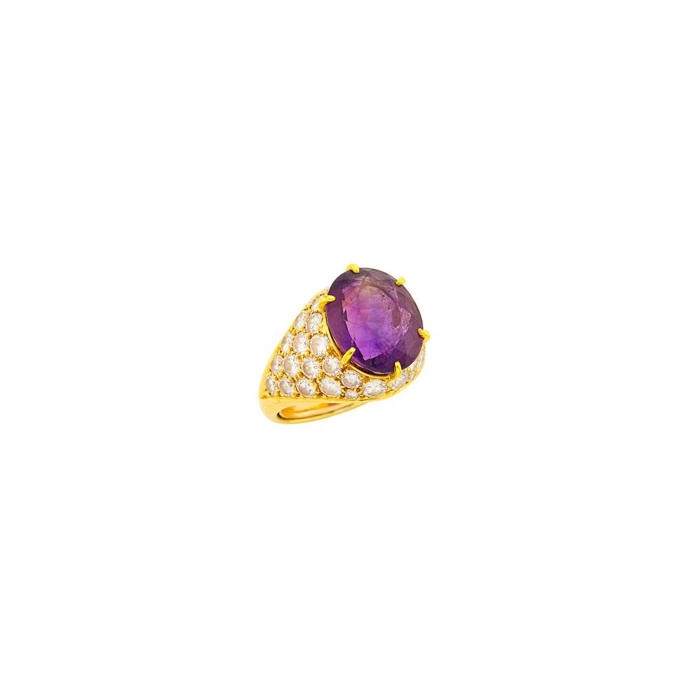 Property of a Distinguished Lady from Athens, Greece18 kt., one oval amethyst ap. 5.75 cts., 38 round diamonds ap. 2.60 cts., signed Cartier Paris, no. 46431, with maker’s mark and French assay mark, ap. 5.2 dwts. Size 4 1/2, with inner guard.

Amethyst: medium deep purple, cleanish, light scratches to table, moderate table edge abrasions, lively.Diamonds: F-G-H-VS.Width 1/2 inch.                            
Any condition statement is given as a courtesy to a client, is an opinion and should not be treated as a statement of fact and our Organization shall have no responsibility for any error or omission. Please contact the specialist department to request further information or additional images that may be available.