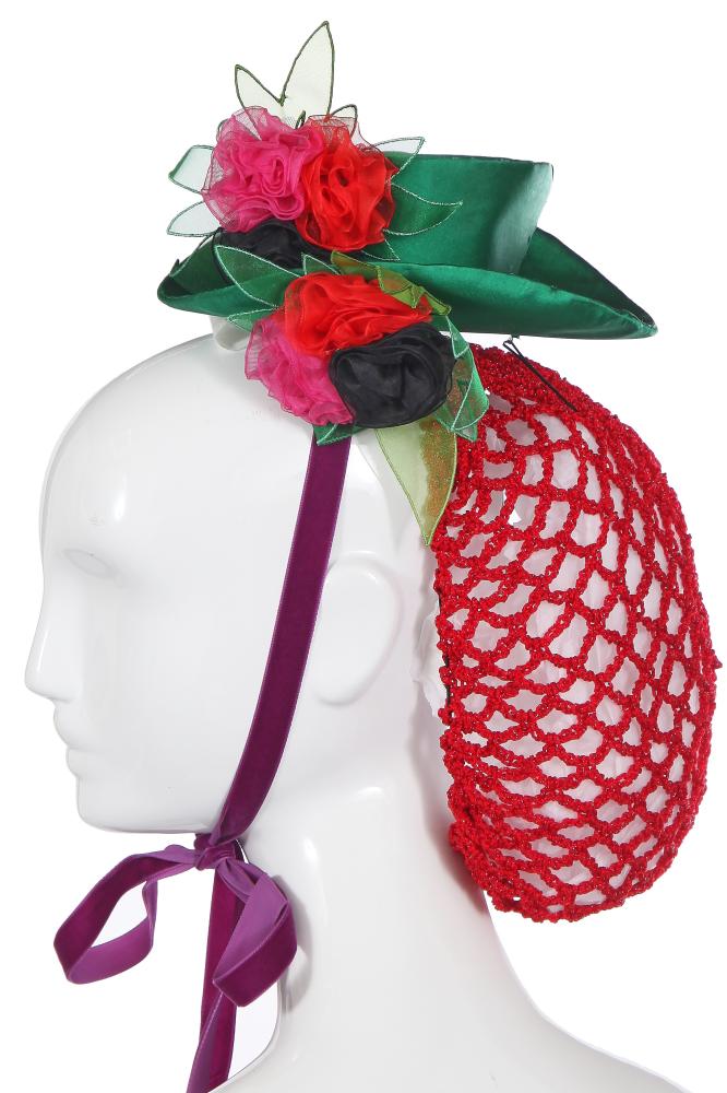 A Stephen Jones miniature green silk tophat, 1991

A Stephen Jones miniature green silk tophat, 1991

labelled, trimmed with black, pink and red silk roses, with an attached red lurex-flecked crochet snood and a purple ribbon for chin fastening, top hat brim 59cm, 23in; with original Stephen Jones hat box (2)

Share this lot: