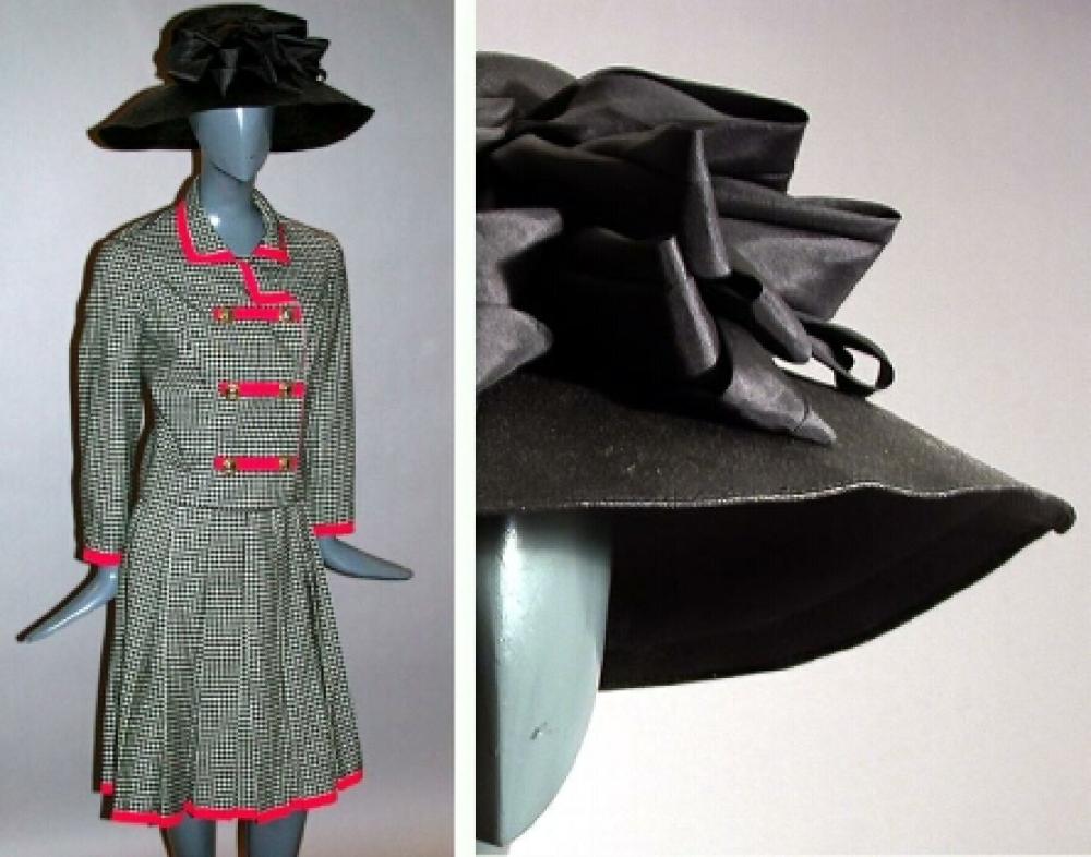 Balmain Black and White Plaid Suit and Straw Hat

Lot 531
Balmain Black and White Plaid Suit and Straw Hat
 French, late 1960s 
 The jacket double breasted, with military style red trim, the skirt pleated, with red trim at hemline, with black straw picture hat, size 8, labeled: Pierre Balmain tape label no.: 137192.
Very good condition.