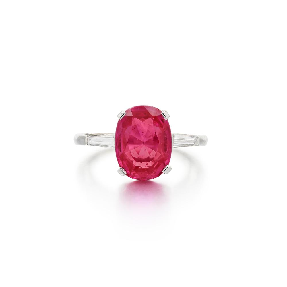 Mellerio

Set with an oval ruby, shouldered by tapered baguette diamonds.