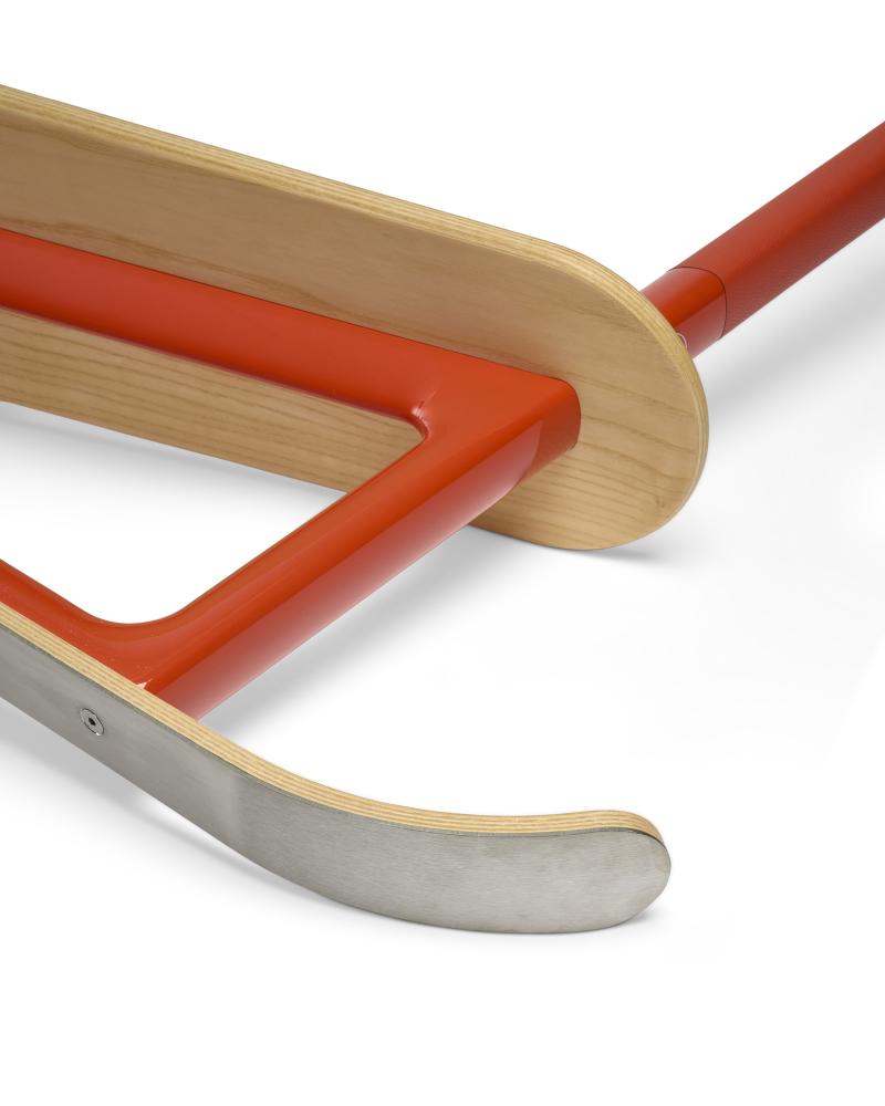 A GROUP OF THREE: A ROUGE CAPUCINE & NATURAL ASH WOOD OFF PISTE ADULT SLED, A WHITE ON WHEELS YO-YO WITH CARAMEL CHÈVRE MYSORE CASE & A YELLOW ON WHEELS YO-YO WITH BLACK CHÈVRE MYSORE CASE