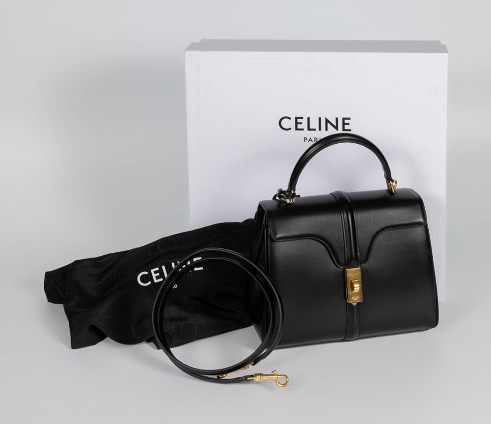 Description

CELINE
16 Classique Small bag.
Black satin-finished calfskin leather with gold-tone metal hardware. With short top handle and removable leather shoulder strap. Turn-lock closure on flap. Interior divided into compartments, with zipper closure in the central one.
Original box and dust bag included.
Measurements: 22 x 18 x 9 cm.
The 16 Classique Small bag by Celine takes its name from the emblematic historical address of the maison, 16 rue Vivienne in Paris, located in the hôtel particulier Colbert de Torcy, a space that symbolizes the heritage and Parisian identity of the firm.
This model is part of Celine’s contemporary aesthetic, characterized by pure lines, formal sobriety and discreet luxury. Its structured design, with balanced proportions and precise closures, reflects an architectural vision of the bag, where functionality is integrated with a refined elegance and without superfluous ornamentation. The 16 Classique has become one of the representative pieces of the maison’s current language.