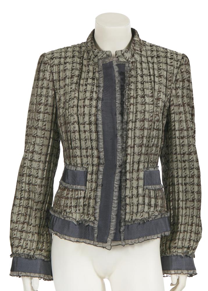 A Giorgio Armani grey silk jacket, Autumn-Winter 2009-10

A Giorgio Armani grey silk jacket, Autumn-Winter 2009-10

labelled, size 46, of pleated grey and black silk woven with abstract houndstooth patterns, the front opening, cuffs and patch pockets trimmed with grey petersham ribbon and grey chiffon ruffles, bust 86cm 34in

Share this lot: