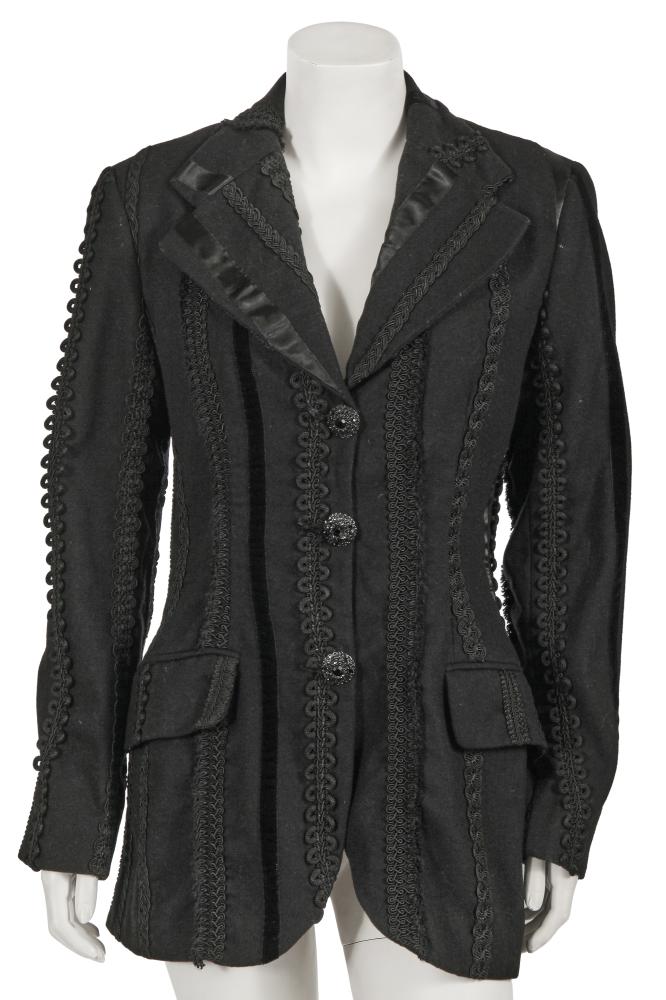 A Dolce & Gabbana embellished black felted wool jacket, circa 1993

A Dolce & Gabbana embellished black felted wool jacket, circa 1993

labelled, size 42, with black satin and velvet ribbon embellishments, various braided trims, ornate gilt and jet-like stone buttons, notched lapels, flap pockets, padded shoulders, bust 97cm 38in

Share this lot: