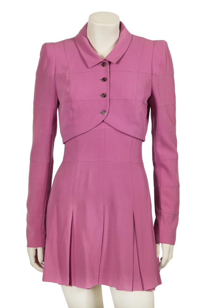 A Karl Lagerfeld pink-purple wool ensemble, 1990s

A Karl Lagerfeld pink-purple wool ensemble, 1990s

labelled, size 36, the cropped jacket formed of narrow panels of fabric creating a checked effect, with hexagonal metal buttons, padded shoulders, bust 86cm 34in; the matching pinafore skirt with inverted pleats to hem, waist 66cm 26in (2)

Share this lot: