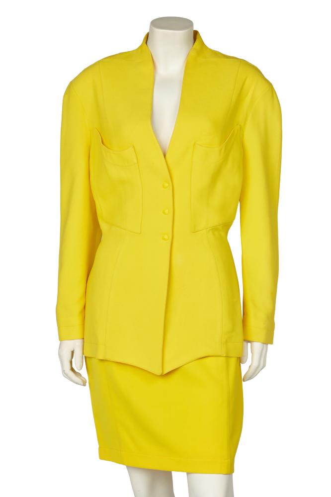 A Thierry Mugler brilliant yellow suit, late 1980s-early 1990s

A Thierry Mugler brilliant yellow suit, late 1980s-early 1990s

labelled, size 42, the long-line jacket with curved breast pockets, triangular yellow popper fastenings, bust 102cm 40in; with a matching skirt, waist 71cm 28in (2)

Share this lot:
