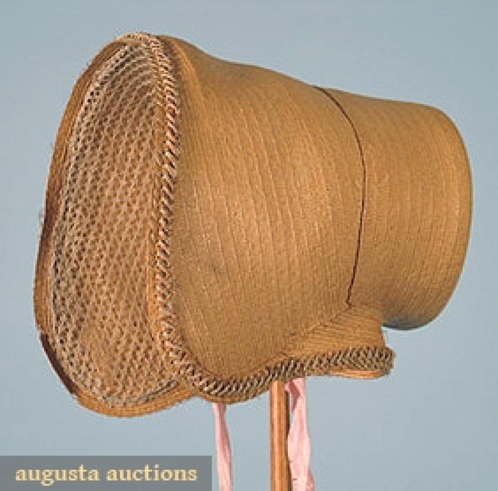 STRAW POKE BONNET, 1840s

Fine braided straw, trimmed w/ narrow horsehair & straw braid, cotton net brim lining, provenance: Catherine Schlicter Brake of Letterkenny Twnship, Franklin County, PA, (few sm. breaks, pink ribbons not original) good; t/w 1880s black straw bonnet, fair.		
Bid Online
Price Realized: $258.75Category:HatsEra:1800-1850
11.7645.942.573