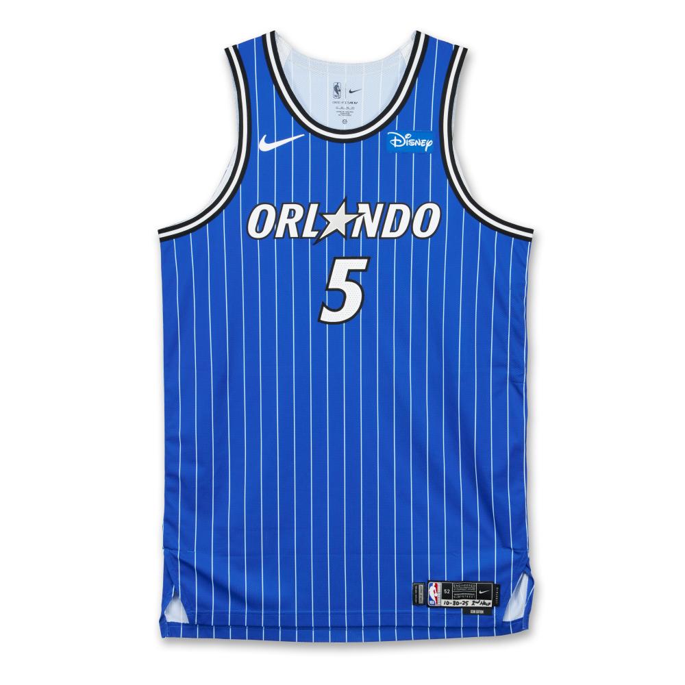 Paolo Banchero Orlando Magic 2025-2026 Game Worn Icon Edition Jersey

NIKE, NIKE MESH JERSEY, SIZE 52 (+6 LENGTH)

MESH

This away ‘Icon Edition’ jersey was worn in the 2nd Half by Paolo Banchero on October 30, 2025 when the Orlando Magic played the Charlotte Hornets.

Banchero finished with 20 points, 9 rebounds, 9 assists, and 2 steals. The Magic beat the Hornets, 123-107.

Paolo Banchero was selected with the first overall pick in the 2022 NBA Draft by the Orlando Magic following a standout season at Duke University. A versatile and well-rounded forward, Banchero is known for his ability to score from all areas of the floor, rebound effectively, and create for his teammates.

Since entering the league, Banchero has rapidly established himself as one of the premier young stars in the NBA. He was named the 2022–23 Kia NBA Rookie of the Year and was a unanimous selection to the NBA All-Rookie First Team. In 2023–24, he earned his first All-Star selection after averaging 22.6 points, 6.9 rebounds, and 5.4 assists per game, becoming the youngest player in Magic history to lead the team in all three categories.

During the 2024–25 season, Banchero elevated his play once again, averaging 25.9 points, 7.5 rebounds, and 4.8 assists per game. He became one of only three players aged 22 or younger in league history to surpass 4,000 points, 1,300 rebounds, and 900 assists within his first three seasons, joining LeBron James and Luka Dončić. Banchero also recorded a career-high 50-point game and helped lead Orlando back to postseason contention.

At the time of cataloging, Banchero holds career averages of 22.3 points, 7.4 rebounds, and 4.9 assists per game. He is a one-time NBA All-Star, the 2022–23 NBA Rookie of the Year, and a member of the 2022–23 NBA All-Rookie First Team.

This jersey has been photomatched by PSA.