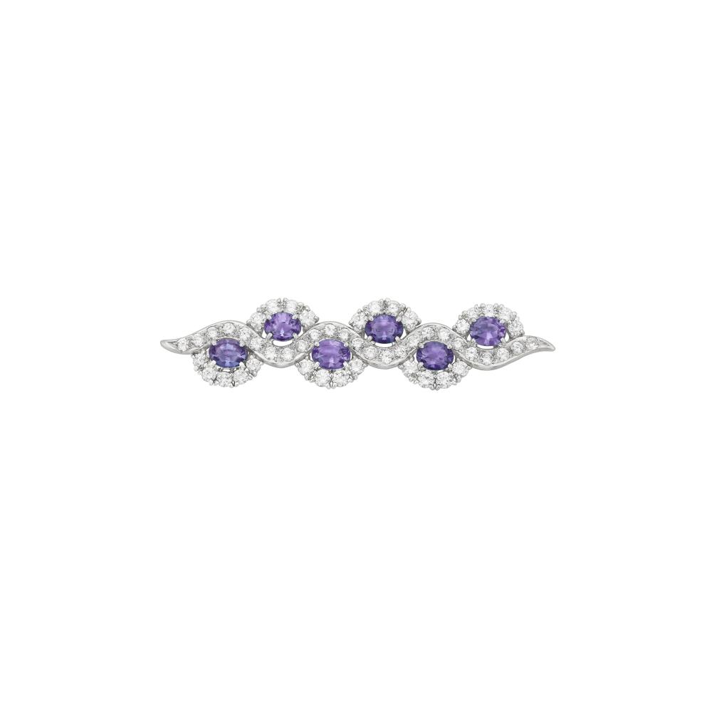 ALEXANDRITE AND DIAMOND BROOCH

Oval-shaped alexandrites, round diamonds, 18k white gold and platinum 
AGL, 2026, report no. 1156036: one tested, 0.37 carat, Brazil, no standard enhancement, clarity enhancement: none, degree of color-change: prominent (90% - 100%), quality of color-change: excellent  
Alexandrites: 6 oval with an approximate total weight of 2.10 carats 
Diamonds: approximately 51 round with an approximate total weight of 1.45 - 1.65 carats 
Size/Dimensions: 5.0 cm (2 in) 
Gross Weight: 8.2 grams