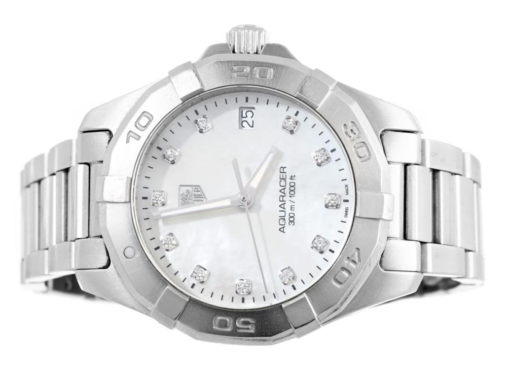 Watches

Tag Heuer

TAG HEUER, Aquaracer (300 m/1000 ft), Serial no. RMY2757, Ref no. WAY1313.BA0915, Case no. WAY1313, ladies´ wristwatch, 32 mm, steel, quartz, sapphire crystal, date, mother-of-pearl-dial with diamonds (11 pcs. 8/8), damaged dial, needs overhaul (see movement picture), original bracelet, folding clasp, Ref no. FAA-Y-C5, length 160 mm, approx. 2013.